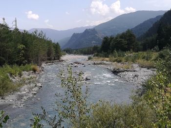 Scenic view of river against sky