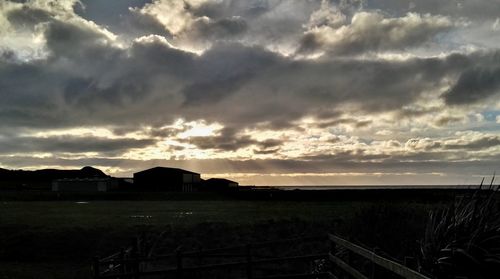 View of landscape against cloudy sky