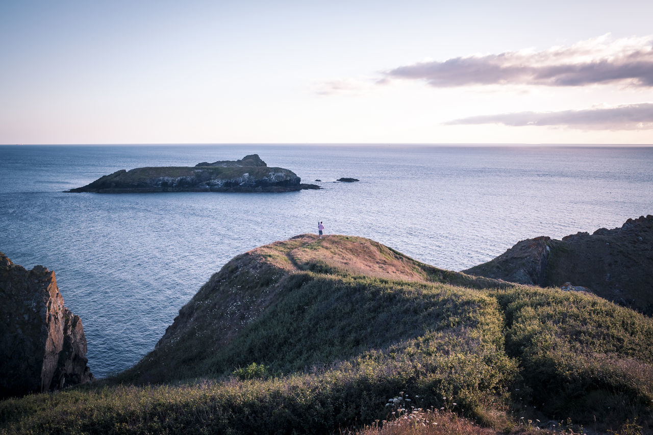 sea, water, sky, scenics - nature, beauty in nature, horizon over water, tranquil scene, horizon, tranquility, land, nature, cliff, rock, idyllic, day, plant, rock - object, rock formation, beach, no people, outdoors