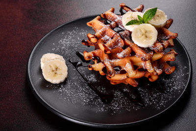 Close-up of food in plate on table