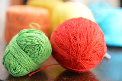 Close-up of wool balls on table