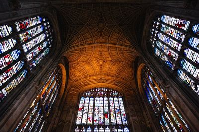 Low angle view of glass window of building