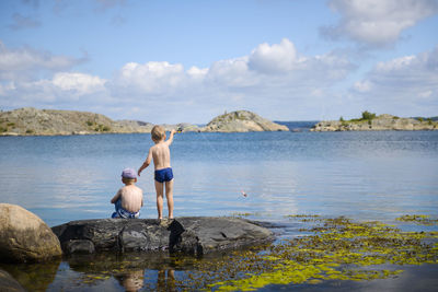 Boys fishing at sea