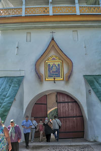 People in front of building