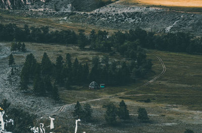 High angle view of road by trees on landscape