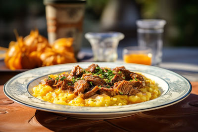 Close-up of food in plate on table