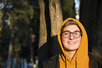 Young adult woman portrait at sunset in the park, tbilisi, georgia