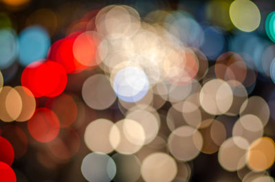 Defocused image of illuminated lights at night