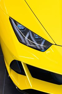 Close-up of yellow car