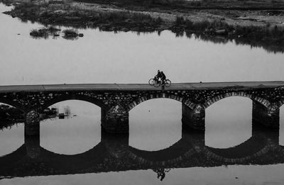Bridge over river against sky