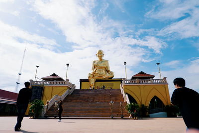 Statue of historic building against sky