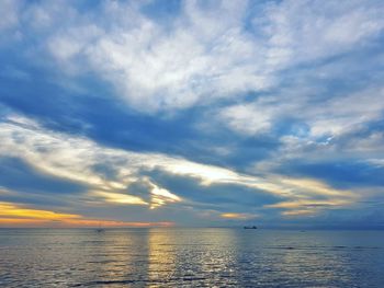 Scenic view of sea against sky at sunset