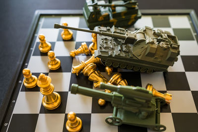 Close-up of chess pieces on table