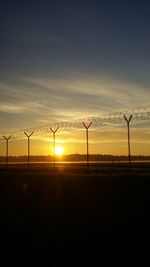 Scenic view of landscape at sunset