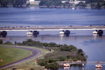 High angle view of river by city against sky