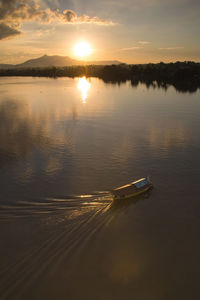 High angle view of lake against sky during sunset