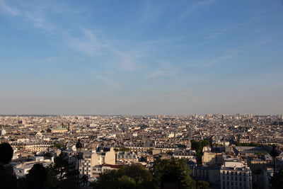 The view of paris from montmartre. a beautiful sunny evening in may