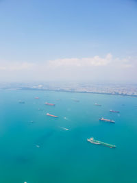 Scenic view of sea against blue sky