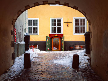 Alley amidst buildings in city