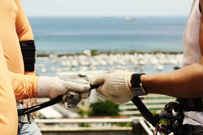 Rappel practitioners with equipment in hand. salvador, bahia, brazil.