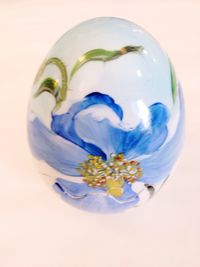 Close-up of white flower over white background