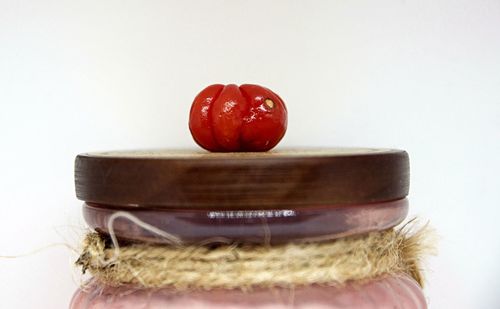 Close-up of strawberry against white background