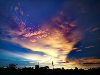 Scenic view of dramatic sky during sunset