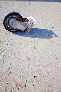 High angle view of skateboard on road