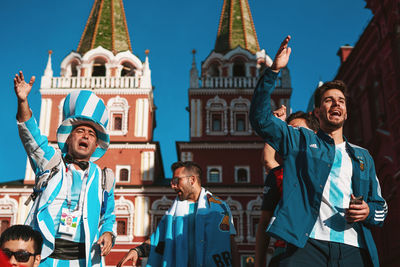 Group of people in front of building