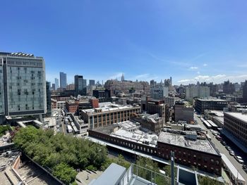 Buildings in city against sky