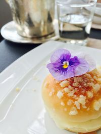 Close-up of purple served on table