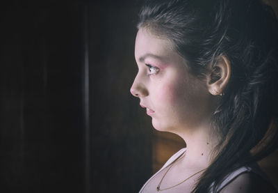 Close-up portrait of serious young woman