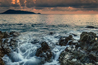 Scenic view of sea against sky during sunset