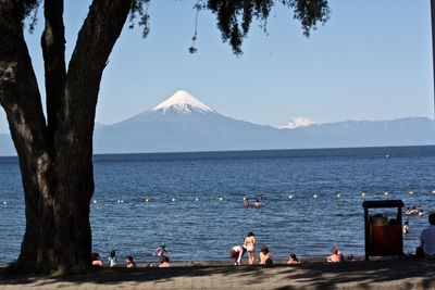 People by lake