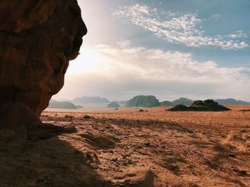 Scenic view of arid landscape against sky