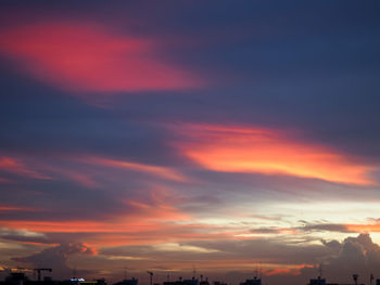 Low angle view of dramatic sky during sunset