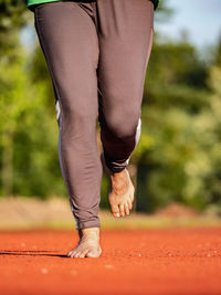 Low section of woman standing on floor