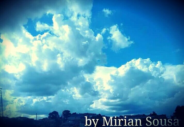 sky, cloud - sky, text, western script, communication, cloudy, cloud, low angle view, blue, tranquility, nature, scenics, sign, information sign, outdoors, tranquil scene, beauty in nature, no people, capital letter, day