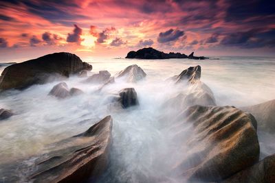 Scenic view of sea against sky during sunset