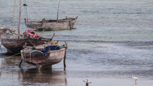 Boats on sea shore