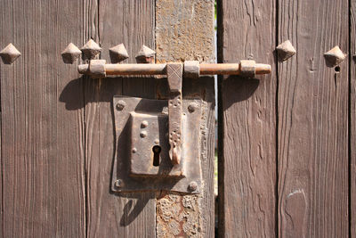 Close-up of rusty metal gate