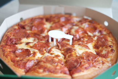 Close-up of pizza in plate on table