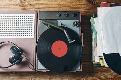 Listening to music from vinyl record. playing music from analog disk on turntable player. stereo set