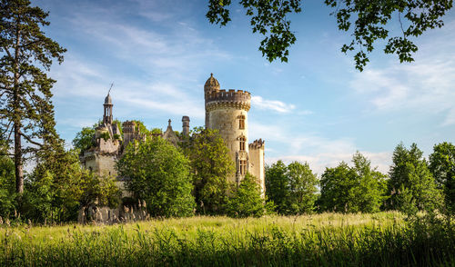 Ruin of la mothe-chandeniers castle in the nouvelle-aquitaine region, france, europe