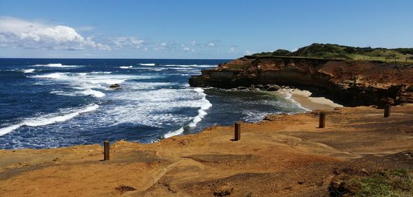 Scenic view of sea shore against sky