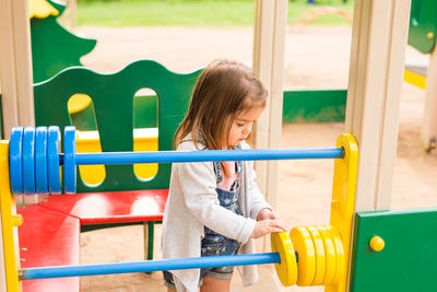 Girl playing in playground