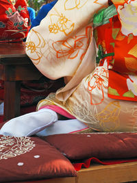 Low section of woman wearing traditional kimono