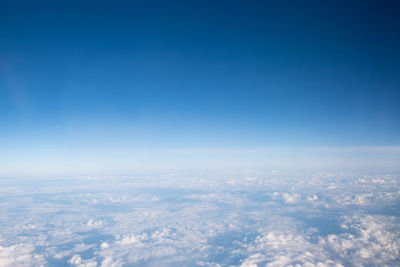 Aerial view of cloudscape against blue sky