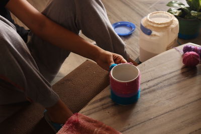 High angle view of coffee cup on table