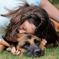 Close-up portrait of woman with dog